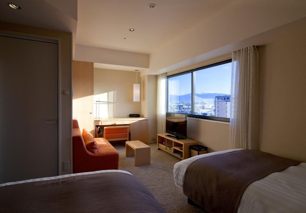 Cocochee Hotel Numazu Chambre photo