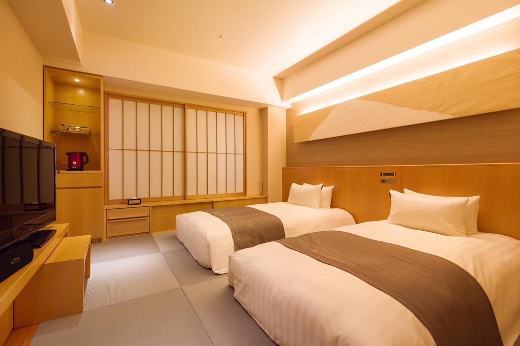 Cocochee Hotel Numazu Chambre photo