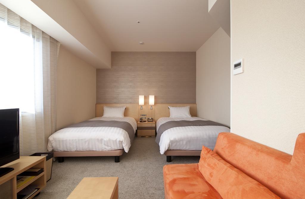 Cocochee Hotel Numazu Chambre photo